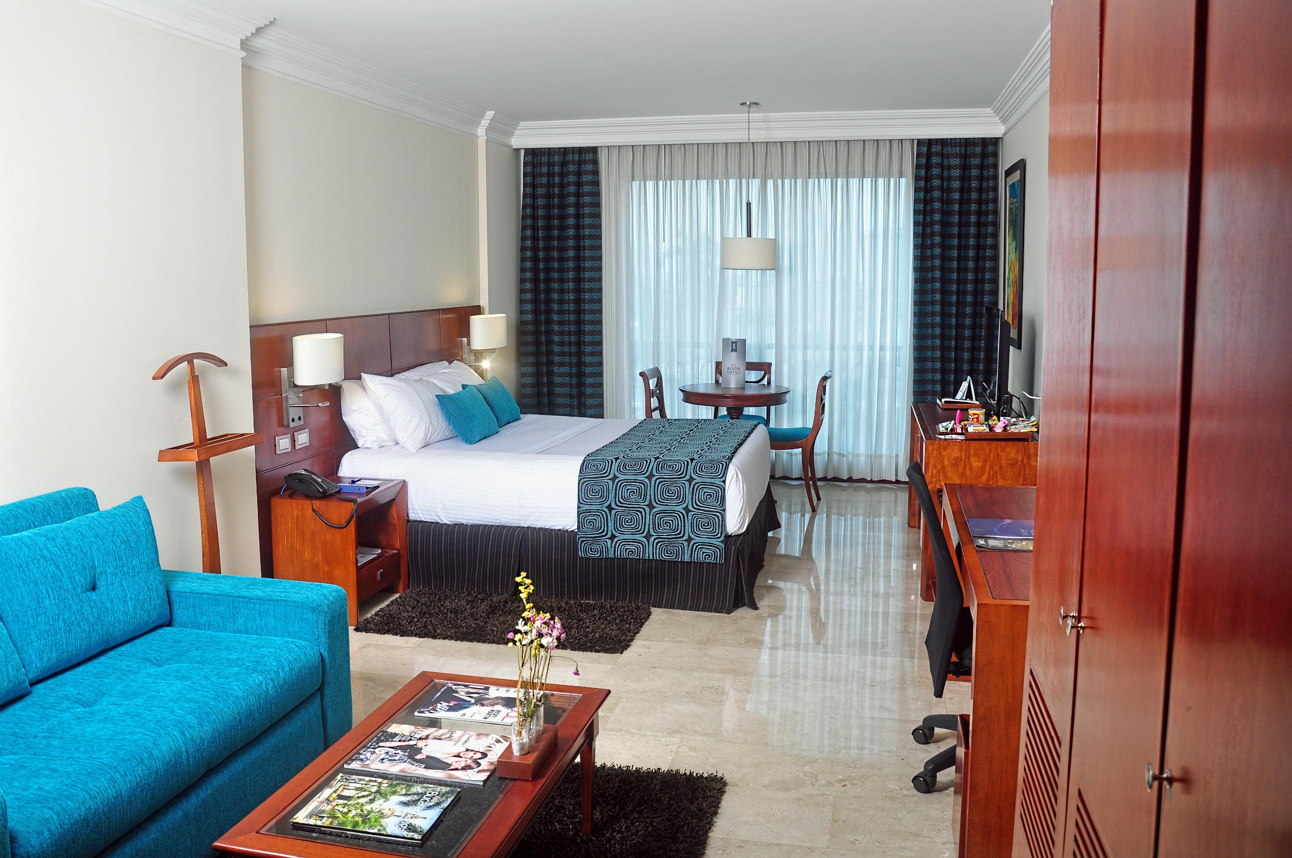 Hotel Dann Carlton بوكارامانغا المظهر الخارجي الصورة A room at the hotel